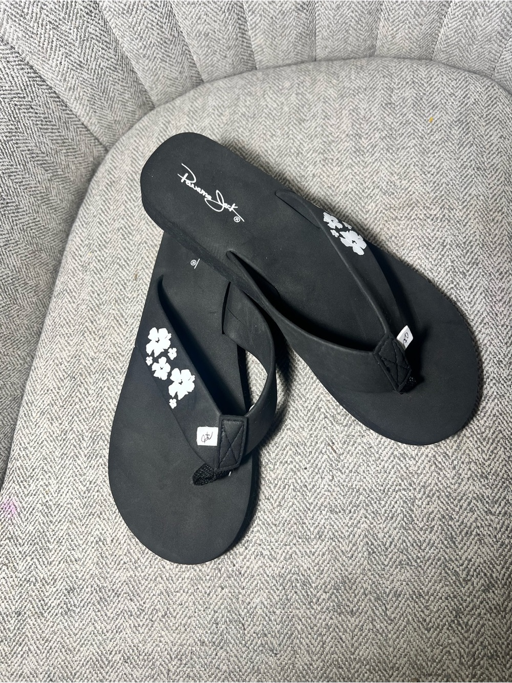 Panama Jack Black Flip Flop Sandals with White Floral Accent